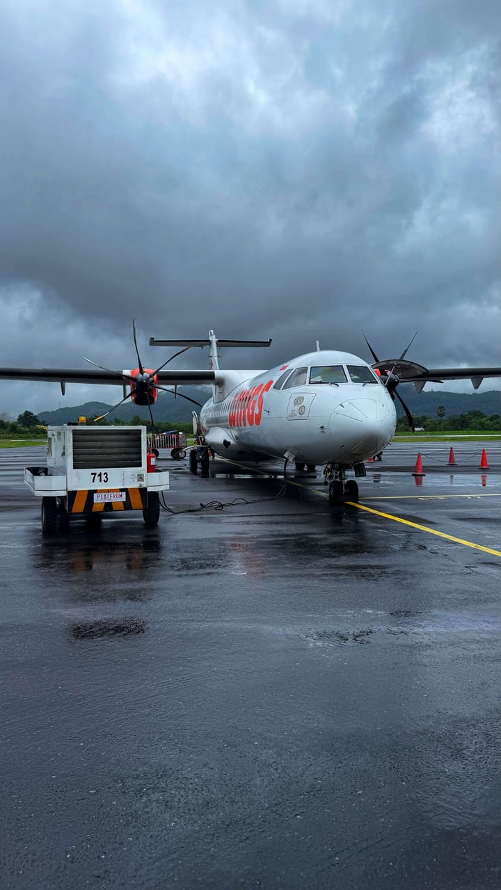 A small, budget airplane on a 